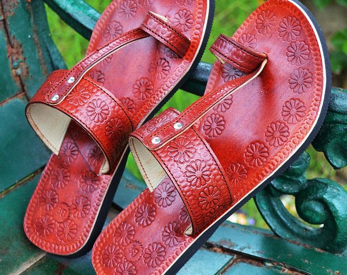 Leather hides stacked on industrial racks in a processing facility